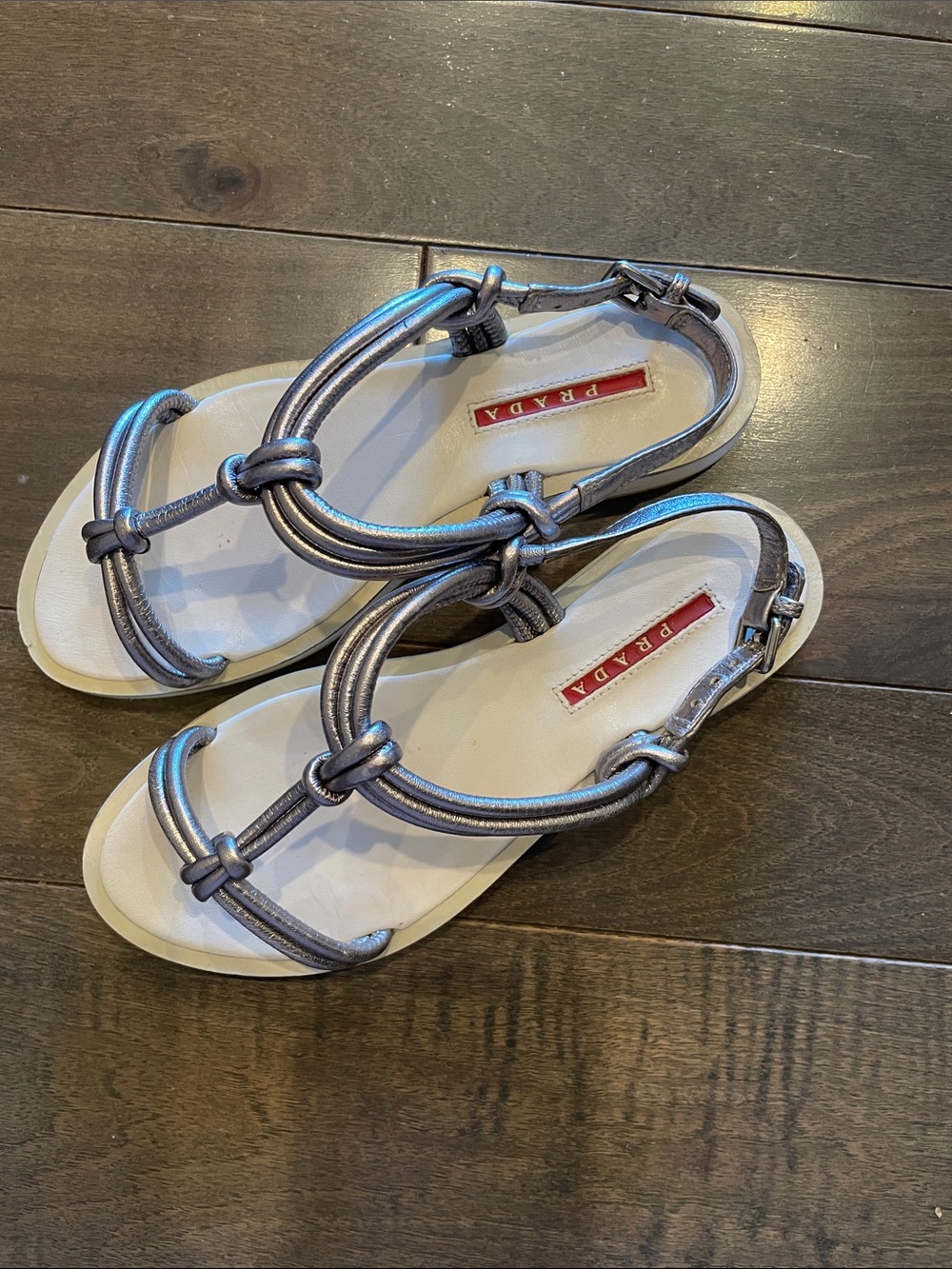 Prada Metallic Silver Knotted Strap Flat Sandals